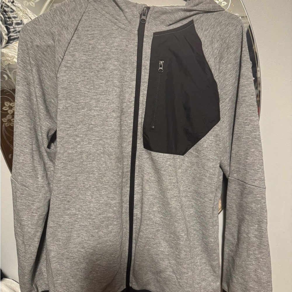 Gray Zip-Up Hoodie with Black Pocket and Matching Sweatpants